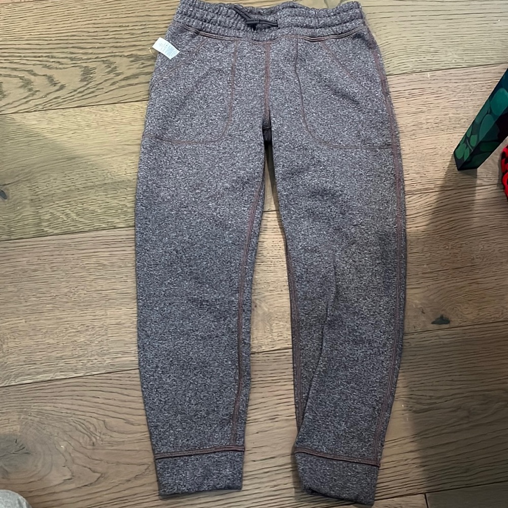 like new, purple Ivivva/Lululemon pants. Size 7, with tags.